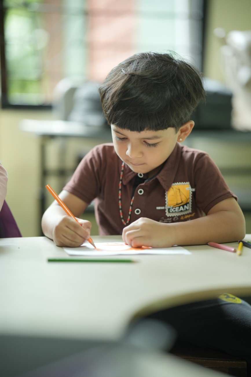 Child at Montessori material
