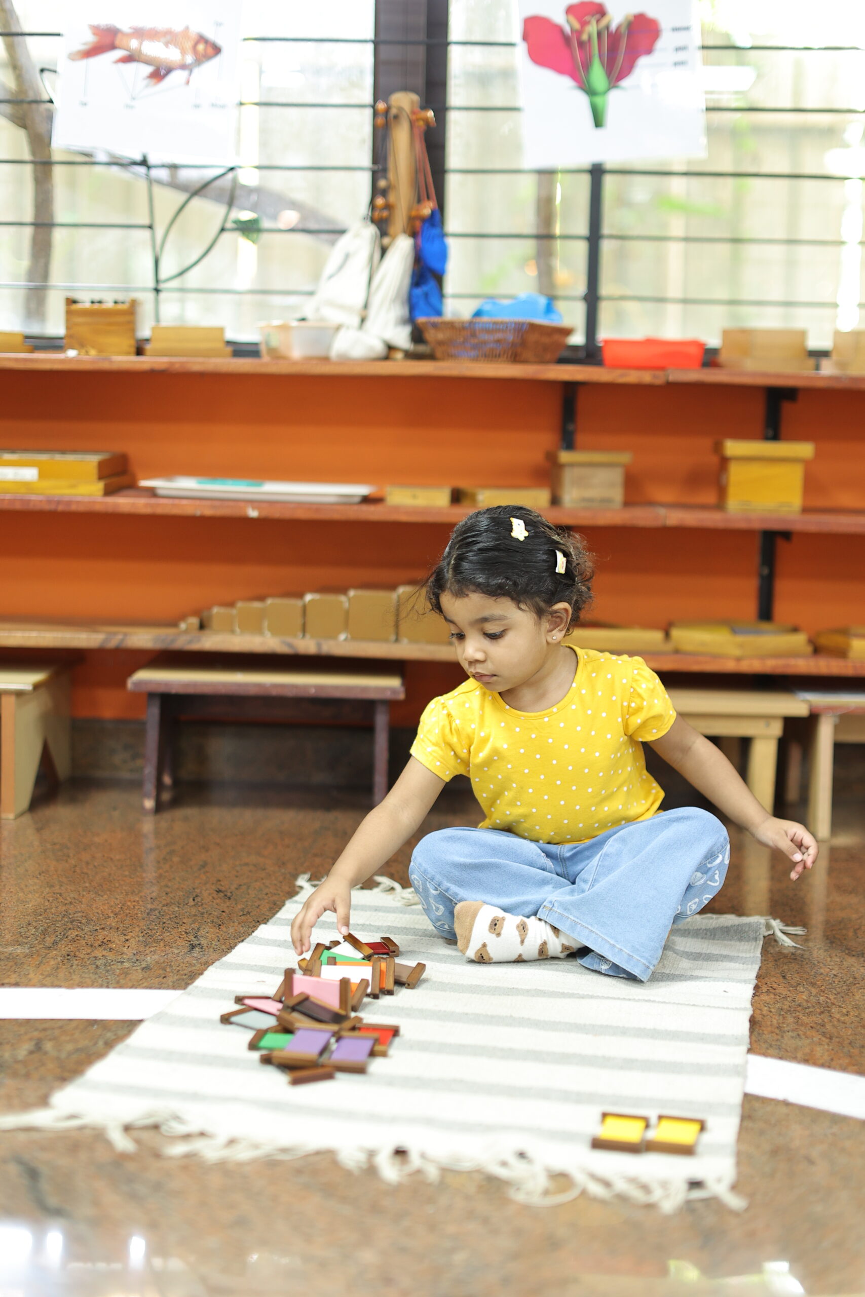 Child at Montessori material